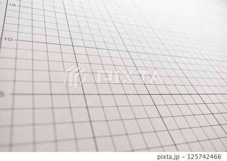 gray cutting mat board background with line and scale measure guide pattern for object art design gray cutting mat board background with line and scale measure guide pattern for object art design 125742466