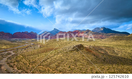 Aerial Red Rock Canyon Cliffs and Desert Landscape in Motion 125742610
