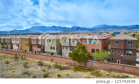 Aerial of Modern Desert Homes with Mountain Backdrop Aerial of Modern Desert Homes with Mountain Backdrop 125742636