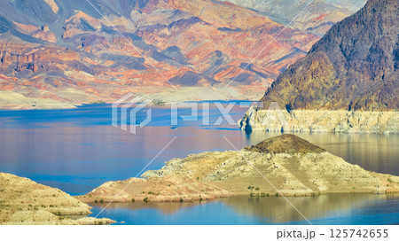 Aerial of Lake Mead's Blue Waters and Rugged Terrain Aerial of Lake Mead's Blue Waters and Rugged Terrain 125742655