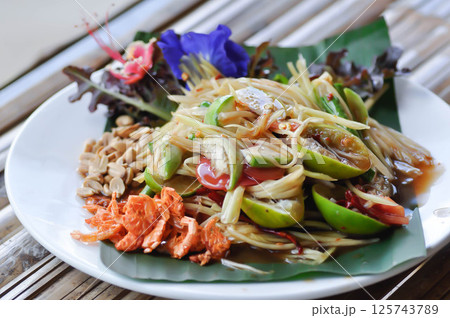 spicy salad, som tam or Thai spicy salad or papaya salad 125743789