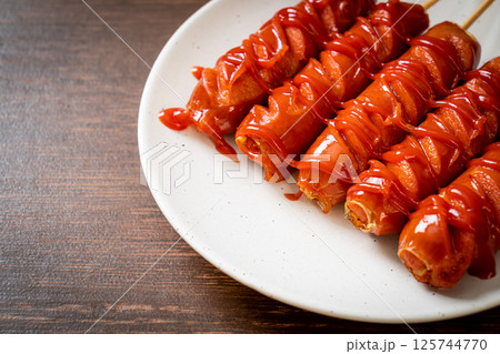fried sausage skewer with ketchup fried sausage skewer with ketchup 125744770