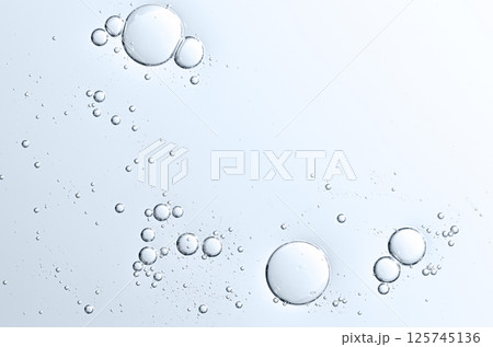 The texture of a cosmetic skin serum or body gel or moisturizer or shampoo. Copy space 125745136