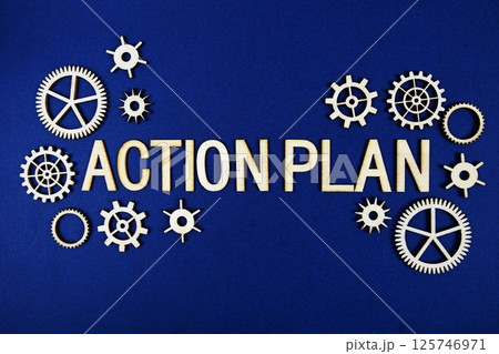 Action Plan alphabet letters with gears element on navy blue background 125746971