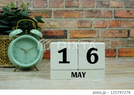 Wooden Calendar Showing the Date of May 16th. Day 16 of May month Wooden Calendar Showing the Date of May 16th. Day 16 of May month 125747276