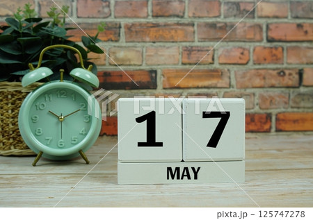 Wooden Calendar Showing the Date of May 17th. Day 17 of May month Wooden Calendar Showing the Date of May 17th. Day 17 of May month 125747278