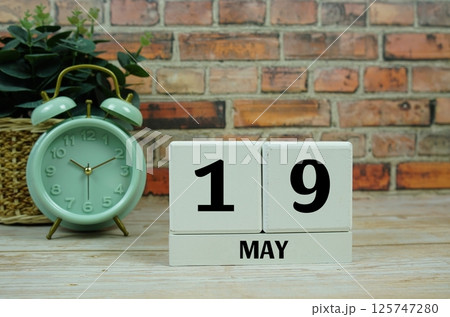 Wooden Calendar Showing the Date of May 19th. Day 19 of May month Wooden Calendar Showing the Date of May 19th. Day 19 of May month 125747280