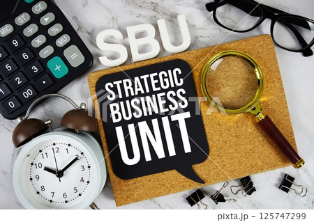 SBU Strategic Business Unit acronym with calculator, alarm clock and magnifying glass, business concept background SBU Strategic Business Unit acronym with calculator, alarm clock and magnifying glass, business concept background 125747299
