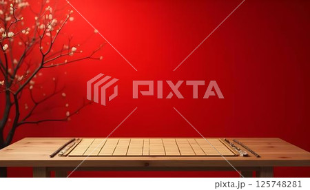 Wooden table and bamboo tree on red background 125748281
