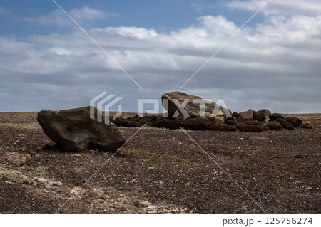 Volcanic rocks and sky with clouds, Gran Canaria, Spain Volcanic rocks and sky with clouds, Gran Canaria, Spain 125756274