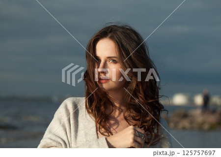 Beauty portrait of brunette woman 30 s years old resting outdoors 125757697