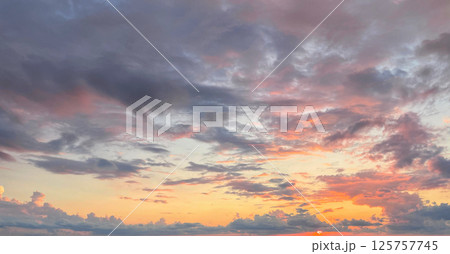 Sunset sky with cloud and sun light. Nature background, skyline landscape Sunset sky with cloud and sun light. Nature background, skyline landscape 125757745
