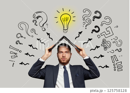 Businessman working in stress at office desk using laptop worried and frustrated 125758128