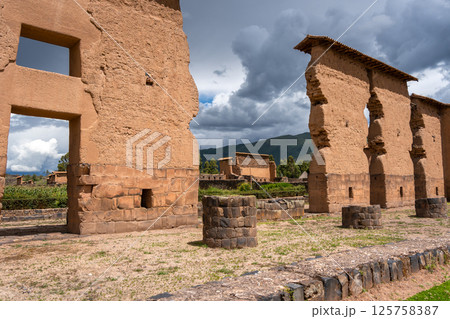 Ancient Ruins of Raqchi in the Peruvian Highlands Under Clouds 125758387