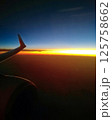 飛行機の窓から見る朝焼け / Sunrise from Airplane Window 125758662