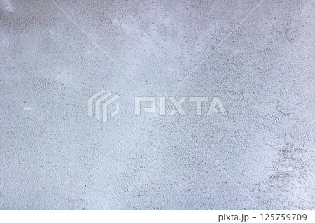 This is a closeup view of a textured surface made of gray granite 125759709