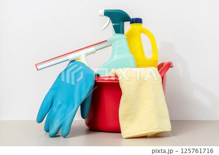 Set of Cleaning supplies in red bucket Set of Cleaning supplies in red bucket 125761716