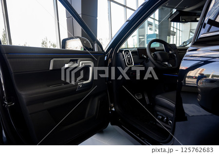Interior of a modern car with black leather seats 125762683