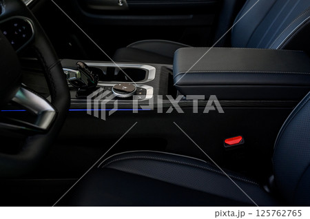 Automatic transmission selector in the interior of a modern car. Automatic transmission selector in the interior of a modern car. 125762765