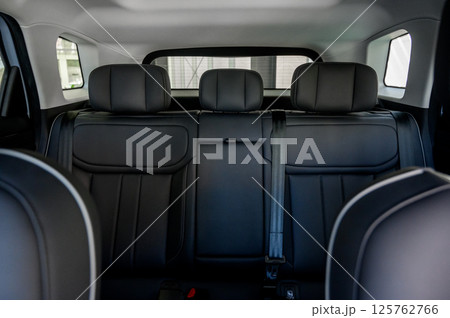 Interior of a modern car with black leather seats 125762766