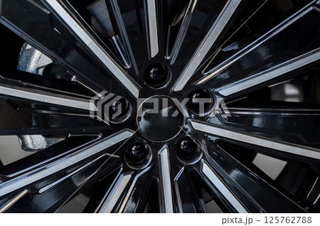 Car wheel with brake calipers and stylish design. Car wheel with brake calipers and stylish design. 125762788