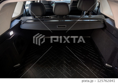 Large black empty car trunk. Open car trunk close up Large black empty car trunk. Open car trunk close up 125762841