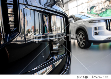 Close up of the headlight of a new modern car 125762846
