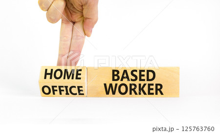 Home or office based worker symbol. Concept words Office based worker Home based worker on wooden cubes. Beautiful white background. Business, home or office based worker concept. Copy space. Home or office based worker symbol. Concept words Office based worker Home based worker on wooden cubes. Beautiful white background. Business, home or office based worker concept. Copy space. 125763760