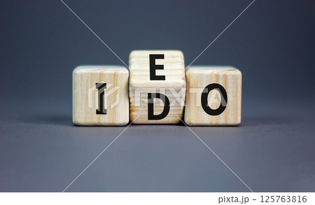 Initial exchange or DEX offering symbol. Concept words abbreviation IEO or IDO on wooden block. Beautiful grey table grey background. Business Initial exchange or DEX offering concept. Copy space. Initial exchange or DEX offering symbol. Concept words abbreviation IEO or IDO on wooden block. Beautiful grey table grey background. Business Initial exchange or DEX offering concept. Copy space. 125763816
