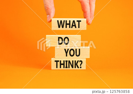 What do you think symbol. Concept words What do you think on beautiful wooden blocks. Beautiful orange table orange background. Businessman hand. Business and What do you think concept. Copy space. What do you think symbol. Concept words What do you think on beautiful wooden blocks. Beautiful orange table orange background. Businessman hand. Business and What do you think concept. Copy space. 125763858