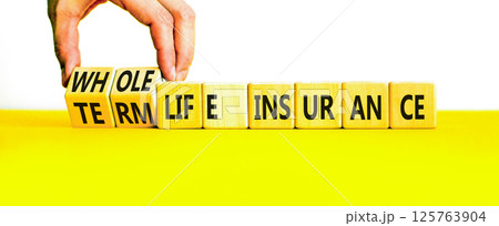 Term or whole life insurance symbol. Concept words Term life insurance or Whole life insurance on wooden blocks. Beautiful white background. Business term or whole life insurance concept. Copy space. 125763904