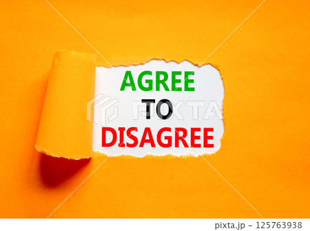 Agree to disagree symbol. Concept words Agree to disagree on beautiful white paper. Beautiful orange paper background. Business and agree to disagree concept. Copy space. 125763938