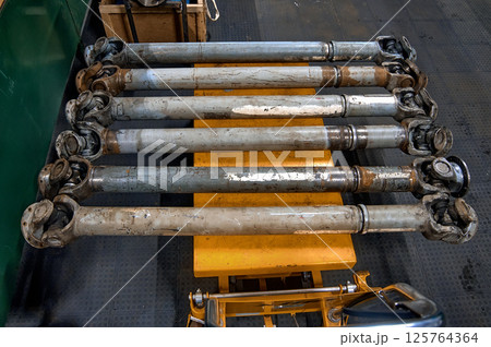 Cardan shaft spare parts old truck transmission dismantled and installed for transportation Cardan shaft spare parts old truck transmission dismantled and installed for transportation 125764364