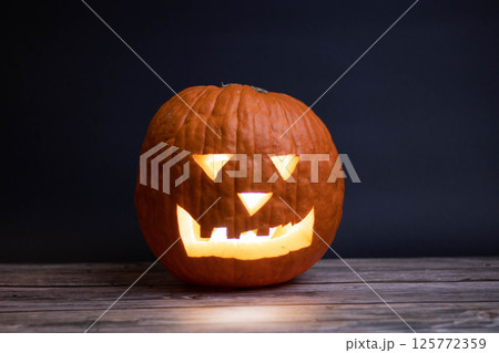 one halloween pumpkin neutral background one halloween pumpkin neutral background 125772359