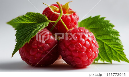 Close-up of organic raspberries represents natural nutrition, the concept of healthy eating and natural food choices, perfect for healthy lifestyle brands and food campaigns 125772943