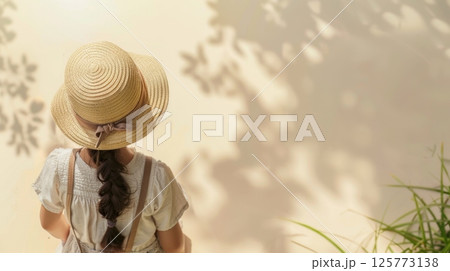 Little girl wearing rattan heat going picnic holiday top of view 125773138