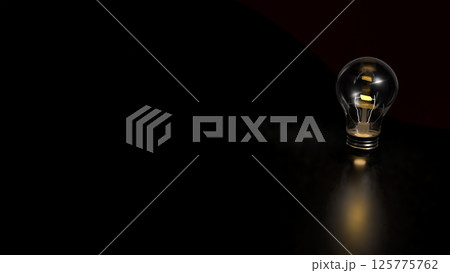 The Light bulb on Black background for creative concept 3d Rendering. The Light bulb on Black background for creative concept 3d Rendering. 125775762