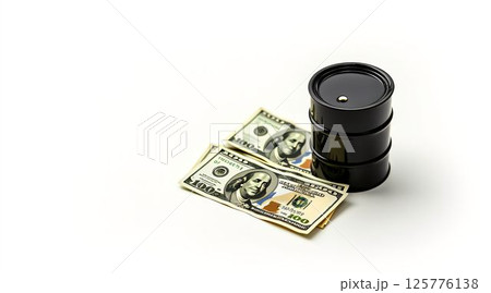Stack of black barrels next to hundred dollar bills illustrating finance and commodity trading concepts 125776138