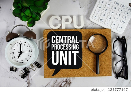 CPU - Central Processing Unit acronym with calculator, alarm clock and magnifying glass, business concept background CPU - Central Processing Unit acronym with calculator, alarm clock and magnifying glass, business concept background 125777147