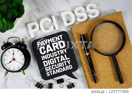 PCI DSS - Payment Card Industry Digital Security Standard acronym with alarm clock and magnifying glass, business concept background PCI DSS - Payment Card Industry Digital Security Standard acronym with alarm clock and magnifying glass, business concept background 125777360
