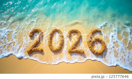 Countdown to 2026 with sand numbers on a beach as waves gently wash over them Countdown to 2026 with sand numbers on a beach as waves gently wash over them 125777646
