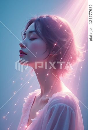 Serene woman in soft light with sparkles and dreamy atmosphere 125777689