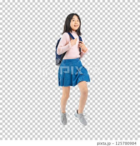 Elementary school girl jumping with a backpack. Full-body photo PNG with transparent background precisely cut out by hand. Elementary school girl jumping with a backpack. Full-body photo PNG with transparent background precisely cut out by hand. 125780984