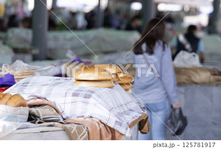 a pita or lepeshka is on sale in Siyob bazaar or so called Siab bazaar is the biggest bazaar in Samarkand. a pita or lepeshka is on sale in Siyob bazaar or so called Siab bazaar is the biggest bazaar in Samarkand. 125781917