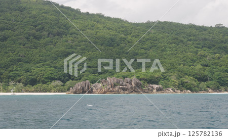 view from boat in Indian ocean sailing between Seychelles islands in daytime view from boat in Indian ocean sailing between Seychelles islands in daytime 125782136