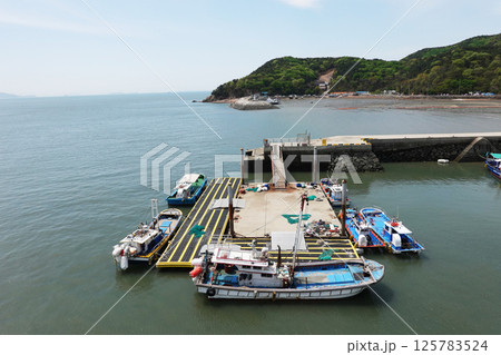 Fishing boats at Somuui Island dock in Incheon, Korea Fishing boats at Somuui Island dock in Incheon, Korea 125783524