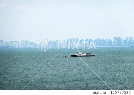 Coast Guard Vessel in Front of Incheon Apartments, Korea 125783526