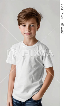 Little boy wearing blank boy white t shirt mockup for print image portrait isolated 125784544