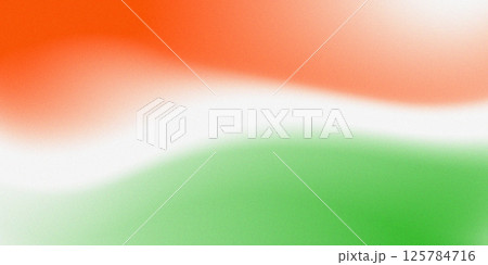 The background is in the colors of the Indian flag with a grainy texture 125784716