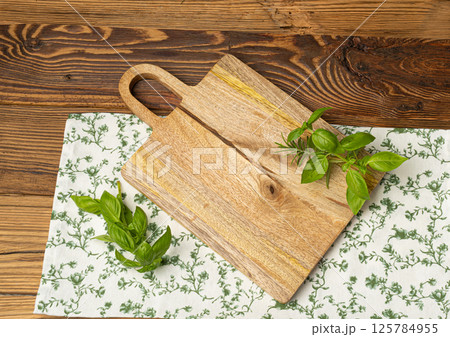 Empty Cutting Board Texture Background, Wooden Chopping Board Mockup with Copy Space for Text Empty Cutting Board Texture Background, Wooden Chopping Board Mockup with Copy Space for Text 125784955